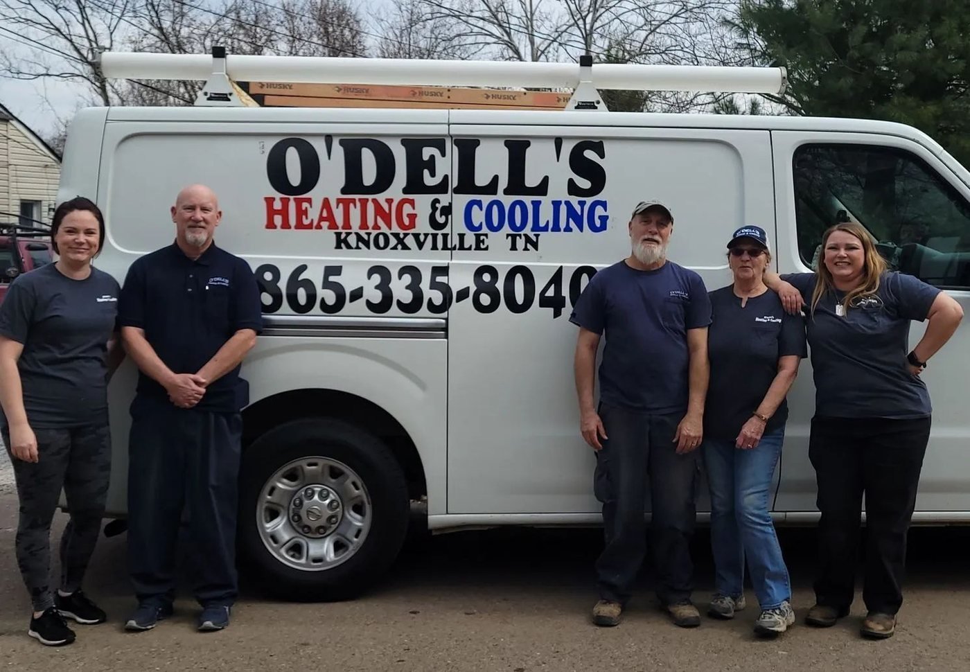 J&J Heating & Air Conditioning service van in Northwood, OH